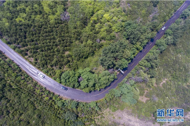 这是6月18日拍摄的位于太原市万柏林区王封乡境内的西山旅游公路（无人机照片）。新华社记者 杨晨光 摄