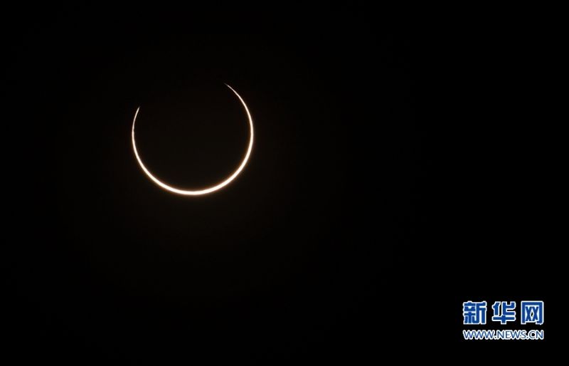 21日下午4时12分，福建漳州，开始食分。新华网 肖和勇 摄