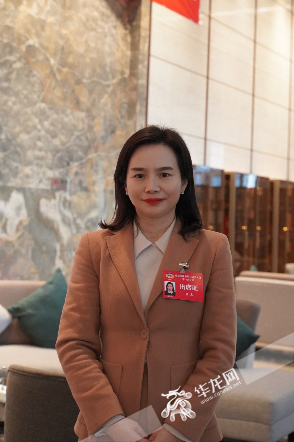 重庆市政协委员陶惠。华龙网-新重庆客户端 邱小雅 摄