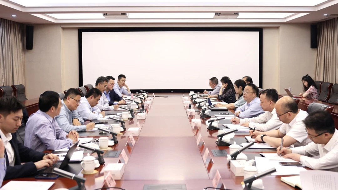 渝北区与复星国际有限公司举行座谈