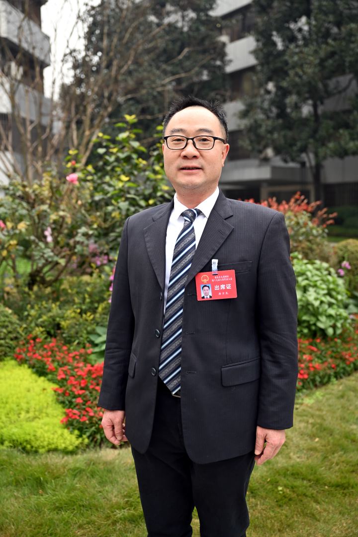 唐万民。 王.jpeg